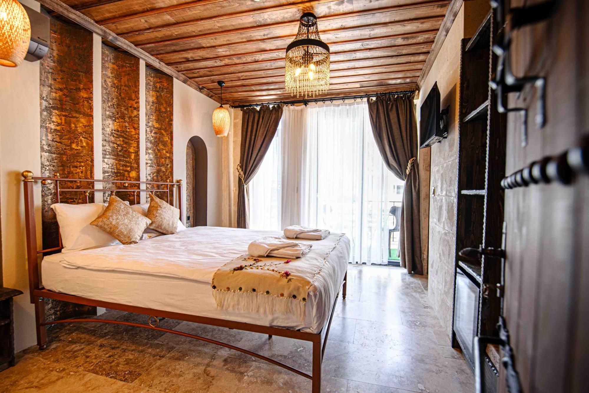 Готель Alika Castle House Учгісар Екстер'єр фото